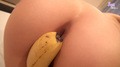 Banana covering her pussy to her anus